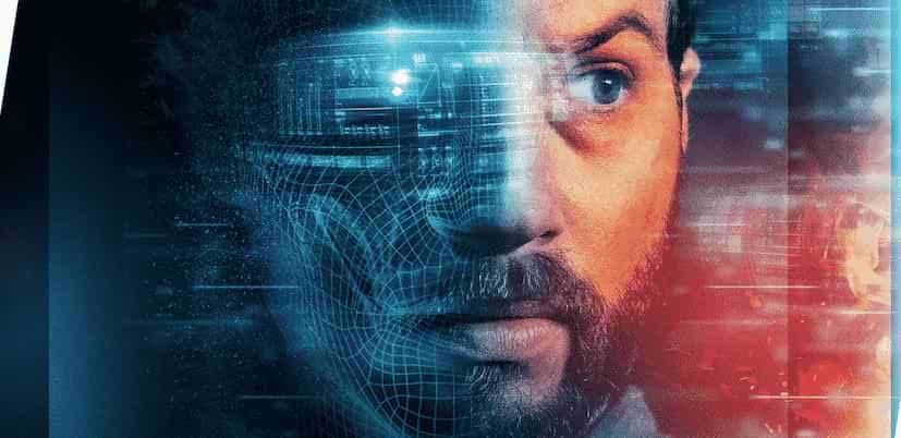 Upgrade movie wallpaper bearded Logan Marshall-Green face close-up with half face hologram in dark blue background