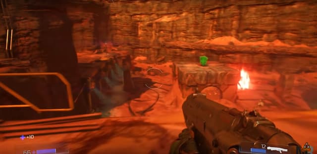 Doom (2016) game battle arena on planet mars holding shotgun