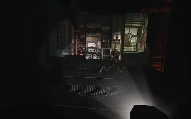 Doom 3 game dark and narrow halls flashlight on sentry bot