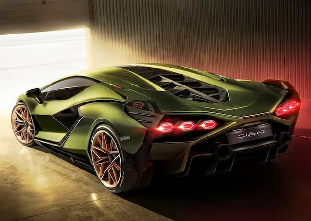 Lamborghini Sián FKP 37 in yellow with gold rims from the back side red taillights brake lights exhaust tips