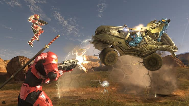 Halo 3 Multiplayer Red vs Blue team shooting bubble shield and warthog on top carrying Spartans