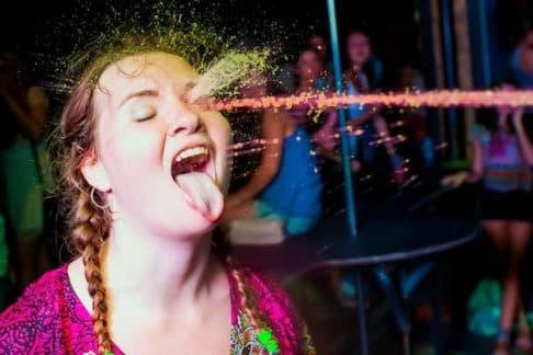 Aim fail liquid hitting girl's eye instead of mouth