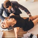 couple being erotic at workplace office