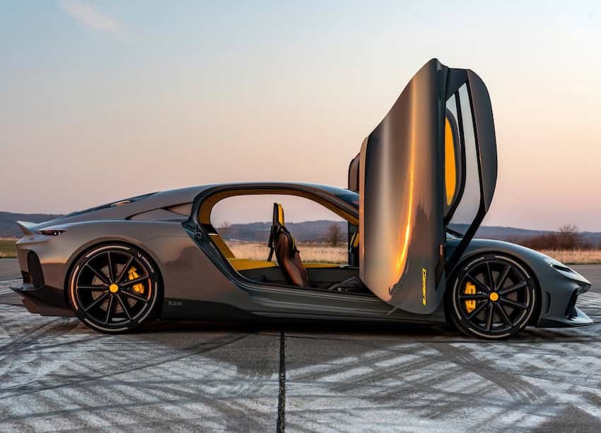 Grey Koenigsegg Gemera side view open scisor doors