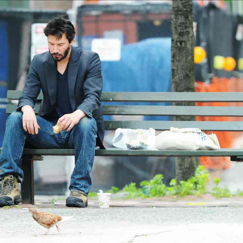 Sad keanu reeves sitting on a bench meme