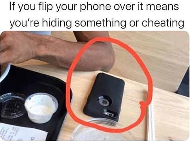 flipping phone facedown cheating meme
