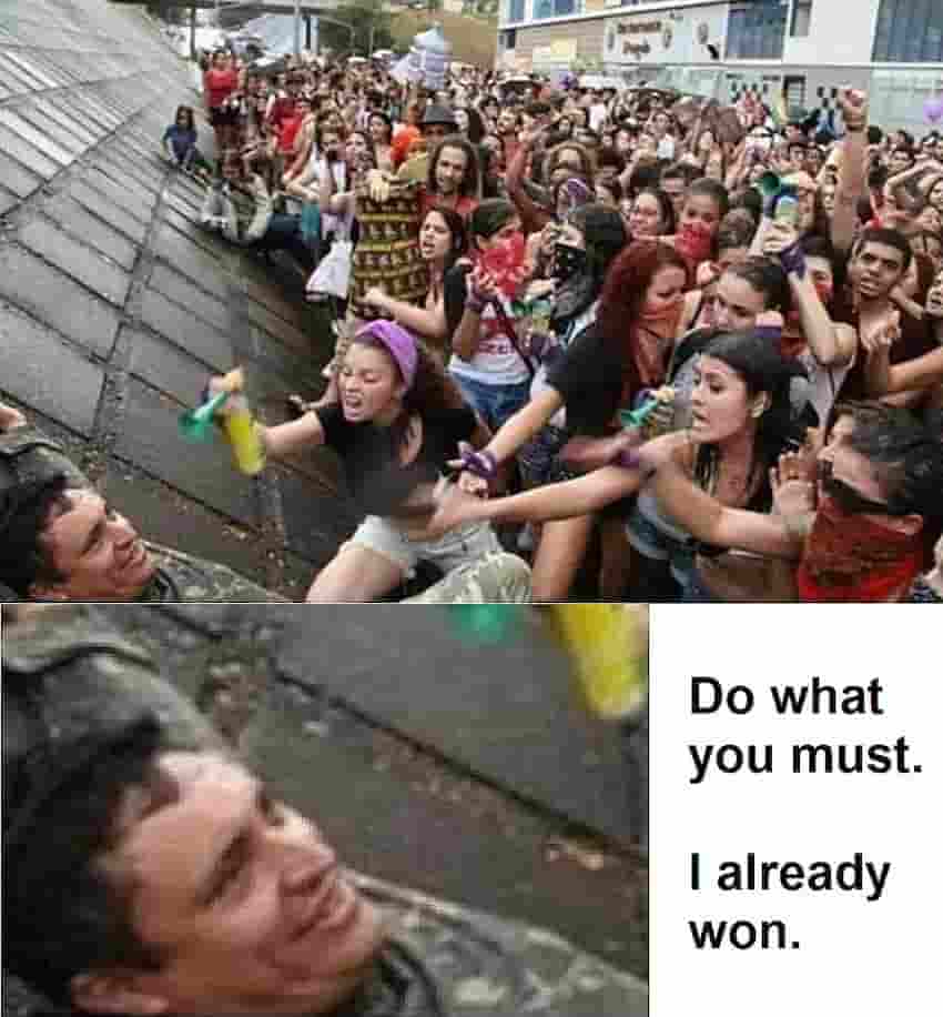 man versus a crowd of feminists