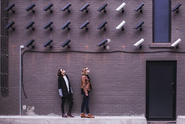 surveillance cameras wathcing people